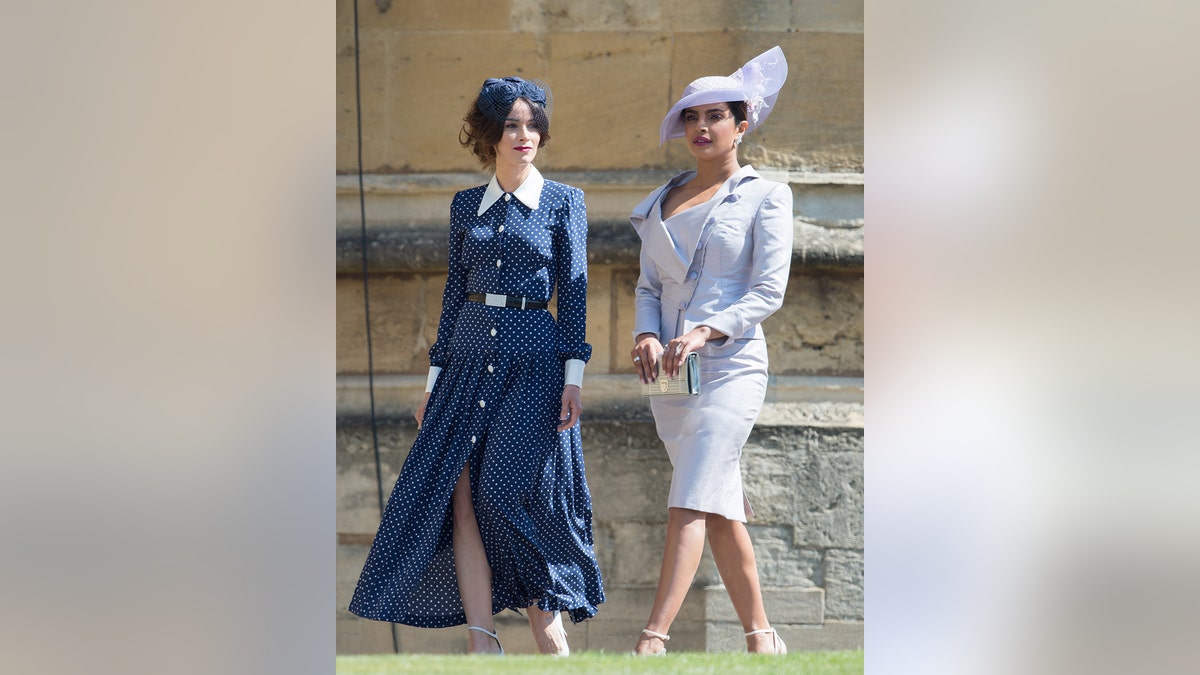 Abigail Spencer (L) and Priyanka Chopra attend the wedding of Prince Harry to Meghan Markle at St George's Chapel, Windsor Castle on May 19, 2018 in Windsor, England.