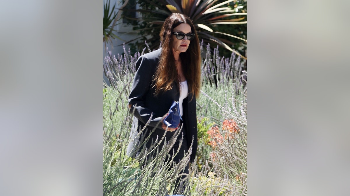 Janice Dickinson is seen for the first time since news broke that convicted sexual predator Bill Cosby had been released early from prison. The former model was dressed in black and had the support of her husband Robert Gerner as a limousine waited outside her Los Angeles home.