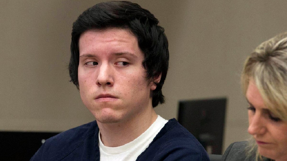 In this Sept. 19, 2019 file photo defendant John Earnest listens during testimony by a witness during a preliminary hearing in Superior Court in San Diego. Earnest pleaded guilty Tuesday, July 20, 2021, to murder and other charges in connection with a deadly shooting at a Southern California synagogue on the last day of Passover.