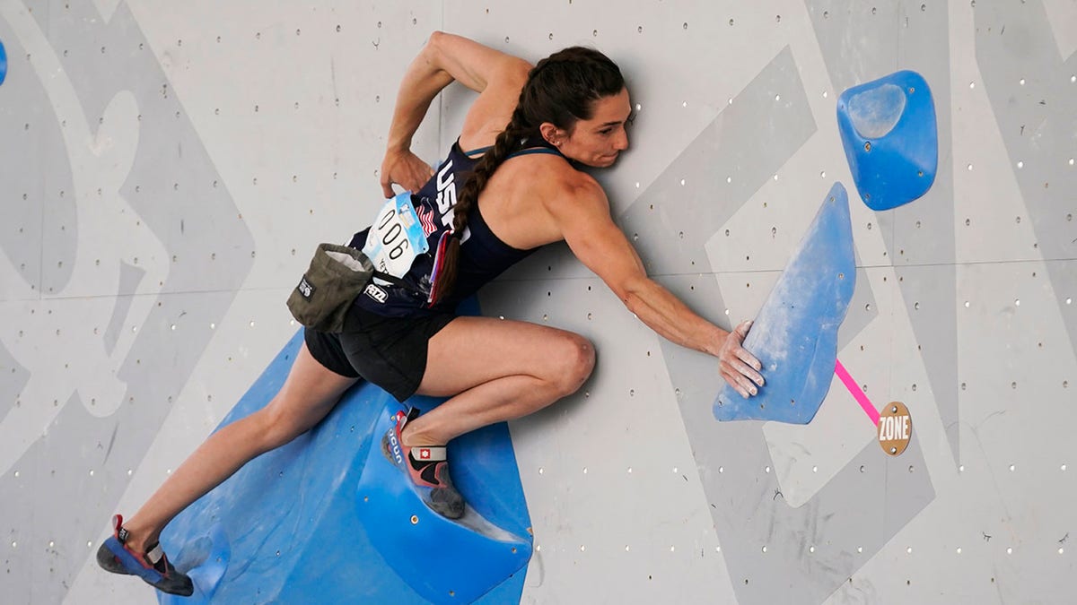 The United States' Kyra Condie climbs during women's boulder qualification at the climbing World Cup on May 21, 2021, in Salt Lake City, Utah. (AP Photo/Rick Bowmer, File)