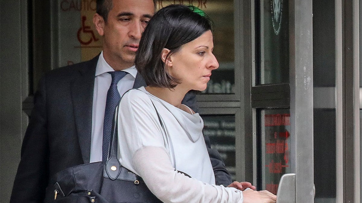 This Oct. 4, 2018 photo shows Lauren Salzman as she leaves Brooklyn Federal Court in New York. Salzman, a former member of NXIVM leader Keith Raniere’s inner circle in his sex trafficking enterprise avoided prison at sentencing Wednesday, July 28, 2021 after prosecutors cited her extraordinary cooperation. 