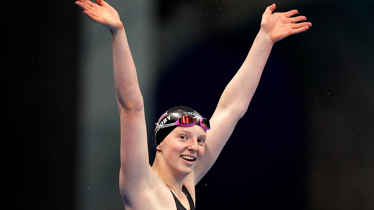 Lydia Jacoby of the United States waves after winning the final of the women's 100-meter breaststroke at the 2020 Summer Olympics, Tuesday, July 27, 2021, in Tokyo, Japan. (AP Photo/Matthias Schrader)