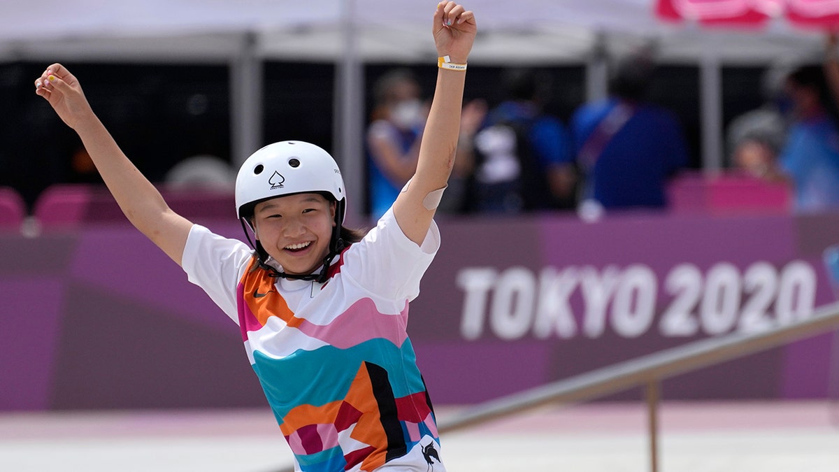 Momiji Nishiya of Japan reacts after winning the women's street skateboarding finals at the 2020 Summer Olympics, Monday, July 26, 2021, in Tokyo, Japan. (AP Photo/Ben Curtis)