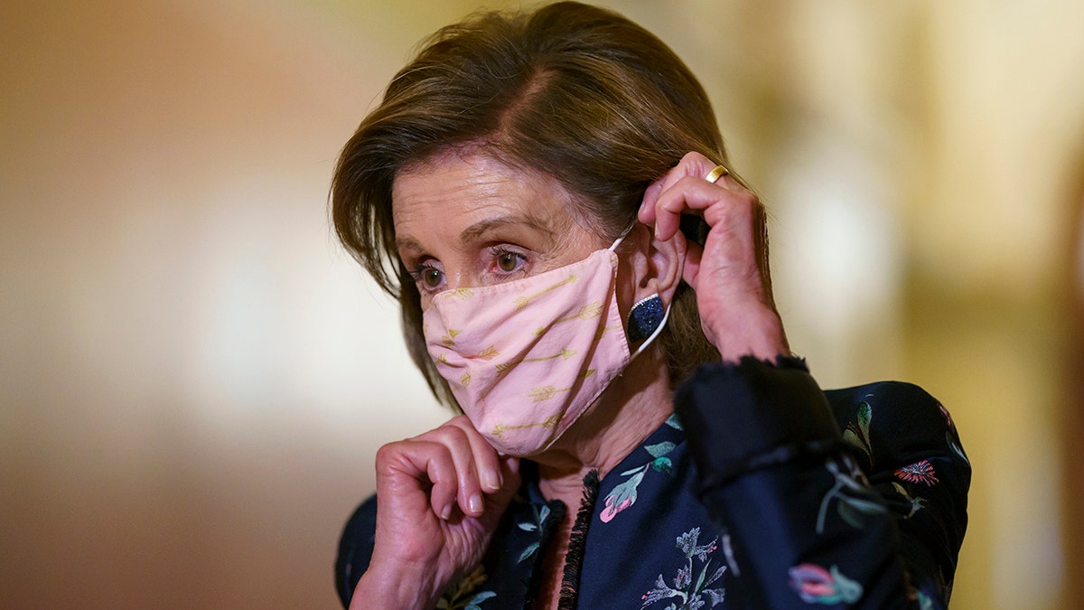 Speaker of the House Nancy Pelosi, D-Calif., wears a face mask as she hosts a visit by King Abdullah II of Jordan at the Capitol in Washington, Thursday, July 22, 2021.?