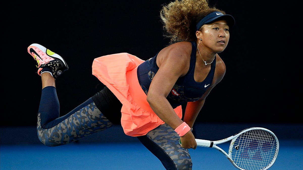 Japan's Naomi Osaka serves to the United States' Jennifer Brady during the women's singles final at the Australian Open tennis championship in Melbourne, Australia, in this Saturday, Feb. 20, 2021. (AP Photo/Andy Brownbill, File)