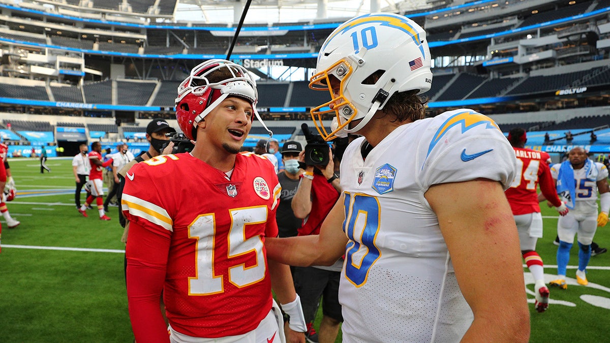 Kansas City Chiefs quarterback Patrick Mahomes and Los Angeles Chargers quarterback Justin Herbert talk after their game Sept. 20, 2020, in Inglewood, California.