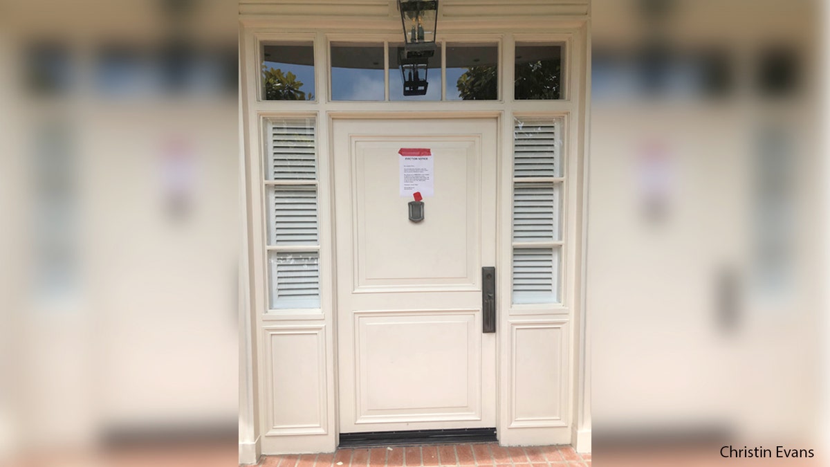 Housing activists protested outside House Speaker Nancy Pelosi's San Francisco home on July 31, 2021 and demanded she reconvene Congress to pass an extension to the eviction moratorium that is set to expire. They posted an "eviction notice" on her door.