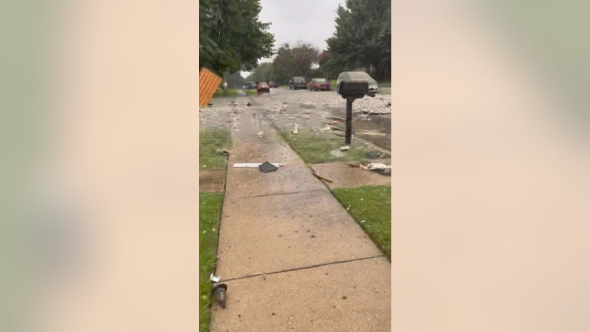 Debris is littered all over a residential street in the Dallas suburb of Plano after a reported explosion Monday. 