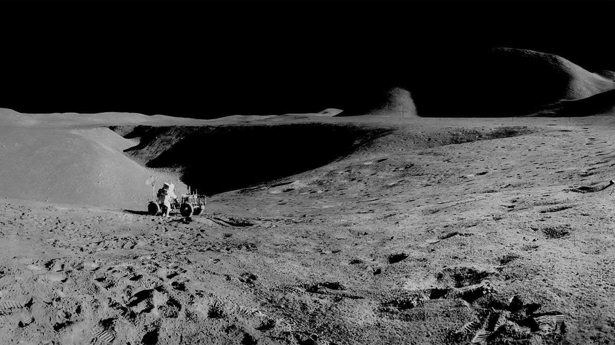 A panorama view of the first use of the Lunar Roving Vehicle (LRV) on the moon and the 14,000-foot Mount Hadley