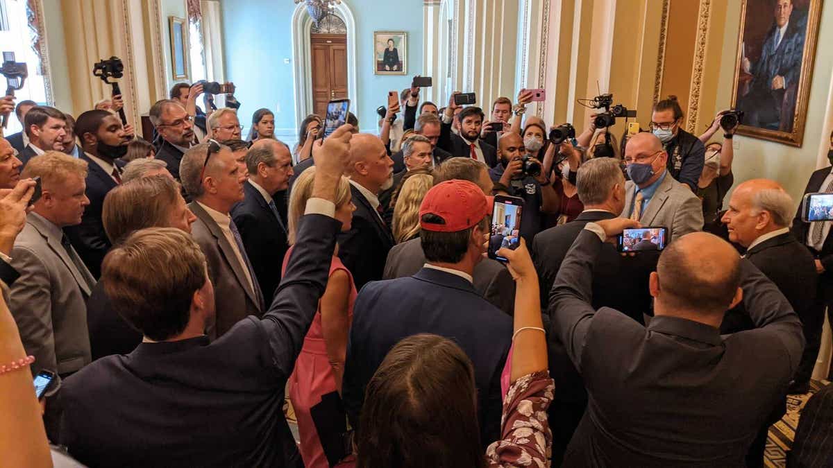 Republican congressmen protest the new House mask mandate