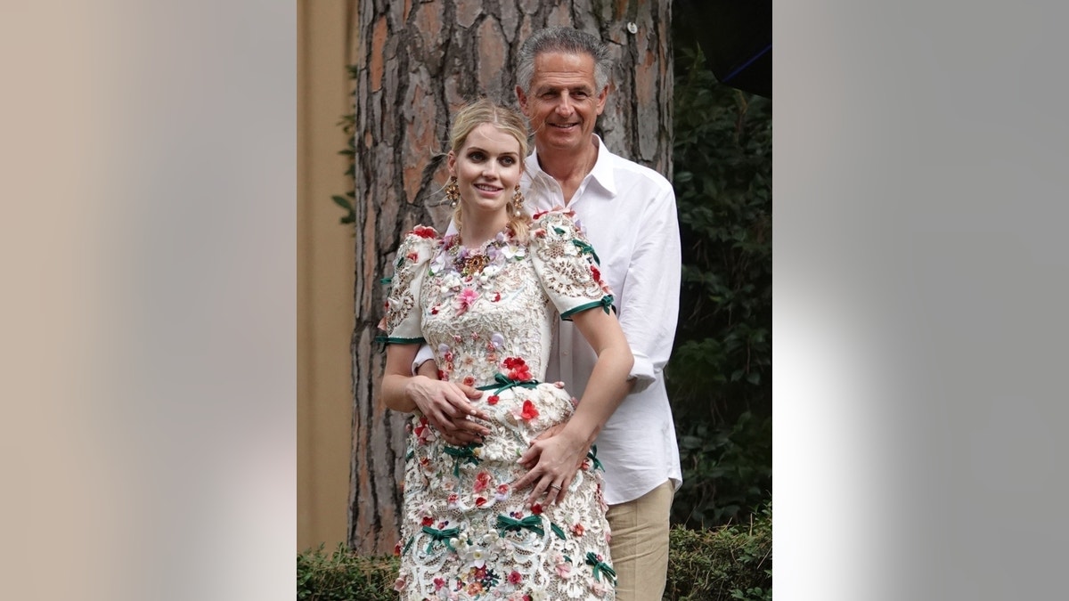 Kitty Spencer and husband Michael Lewis pose for a photo the day after their wedding.