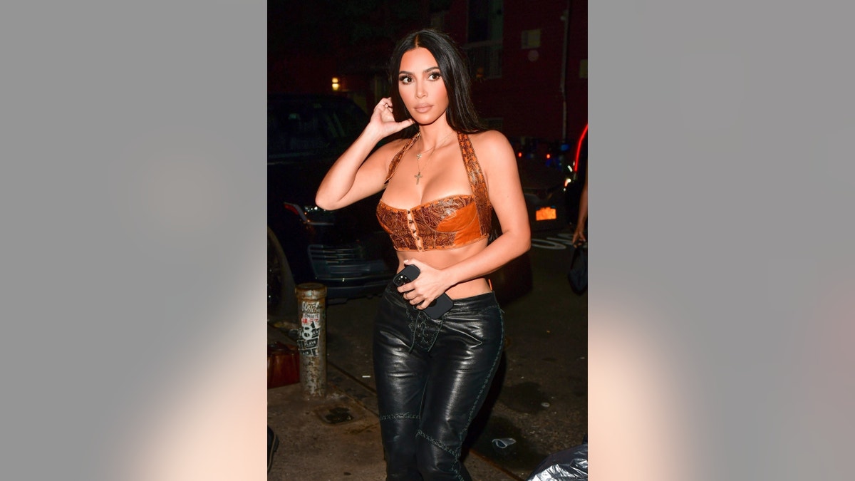 Kim Kardashian puts on eye-popping display in tiny strapless top