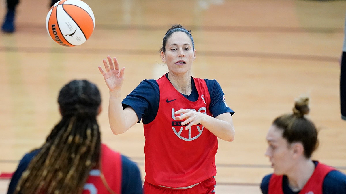 Sue Bird passes during practice for the United States women's basketball team in preparation for the Olympics, Tuesday, July 13, 2021, in Las Vegas. (AP Photo/John Locher)