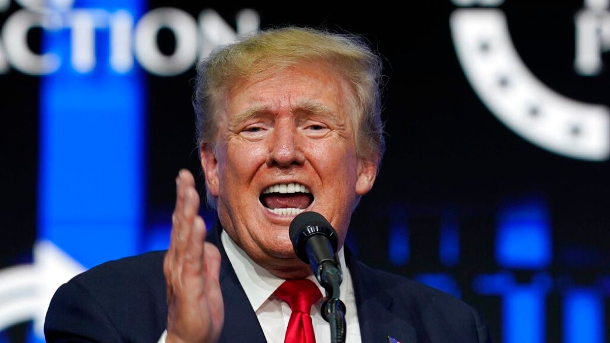 Trump headlines a rally in Arizona, takes aim at Biden