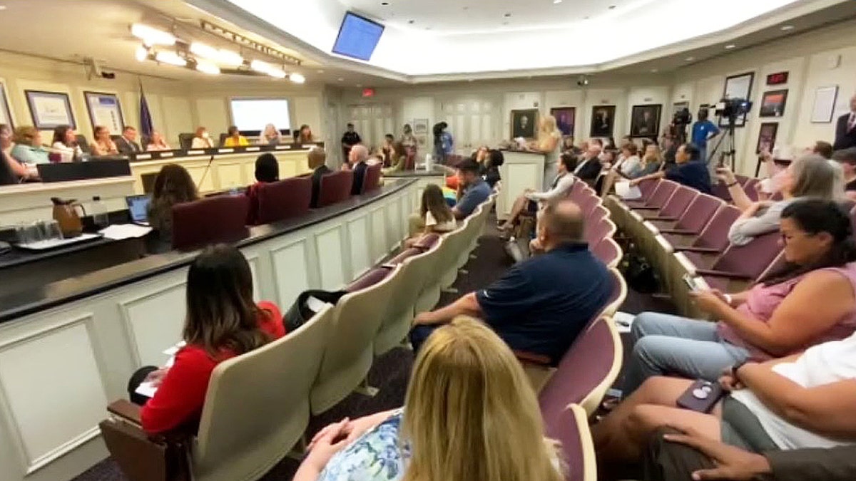 Virginia school board meeting over mask policies gets heated.