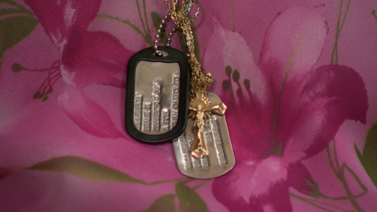 Susana Mallinson, 90, wears her late husband's dog tags.