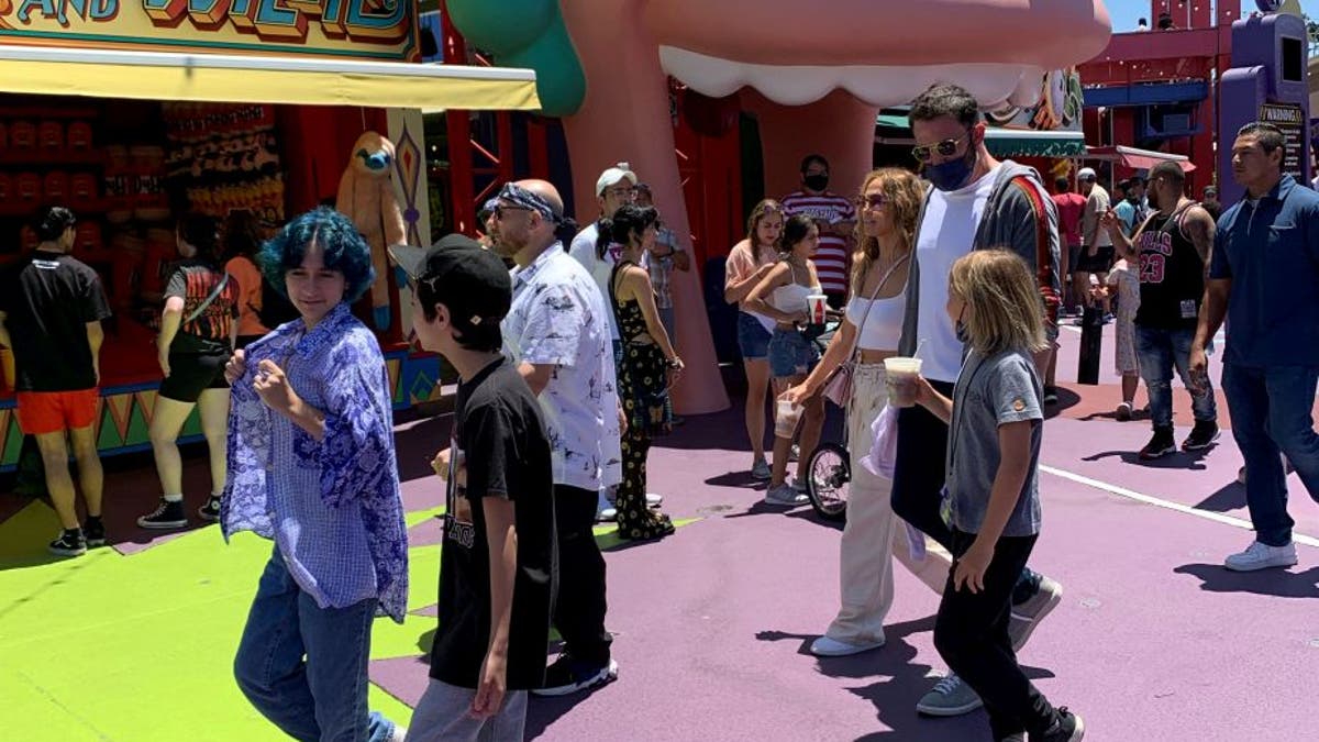 Jennifer Lopez and Ben Affleck went to Universal Studios Hollywood with their children on Friday, July 2, 2021. Lopez's twins Max and Emma, 13, and Affleck's son Samuel, 9 were present during the family trip. (Credit: SWNS)