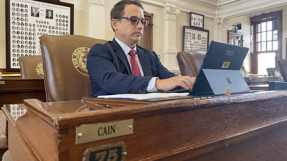 Briscoe Cain at desk