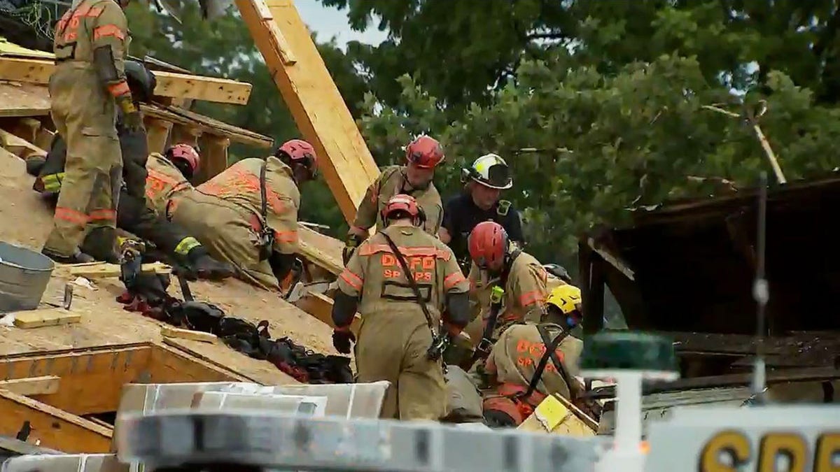One person was trapped in the rubble for roughly an hour and a half, but firefighters were communicating with him and able to rescue him at about 5 p.m. (DC Fire and EMS)
