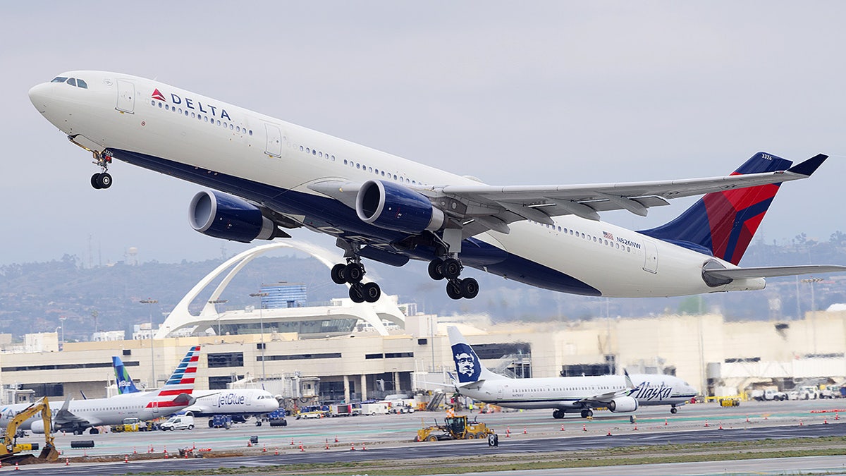 A Delta Air Lines Airbus takes off from Los Angeles International Airport.