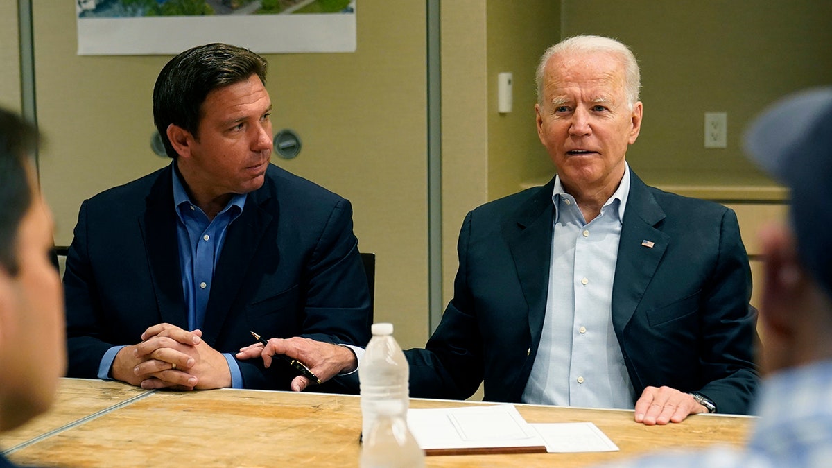 President Joe Biden attends a briefing in Miami Beach, Fla., with Florida Gov. Ron DeSantis, Thursday, July 1, 2021, on the collapsed condo tower in Surfside. (AP Photo/Susan Walsh)