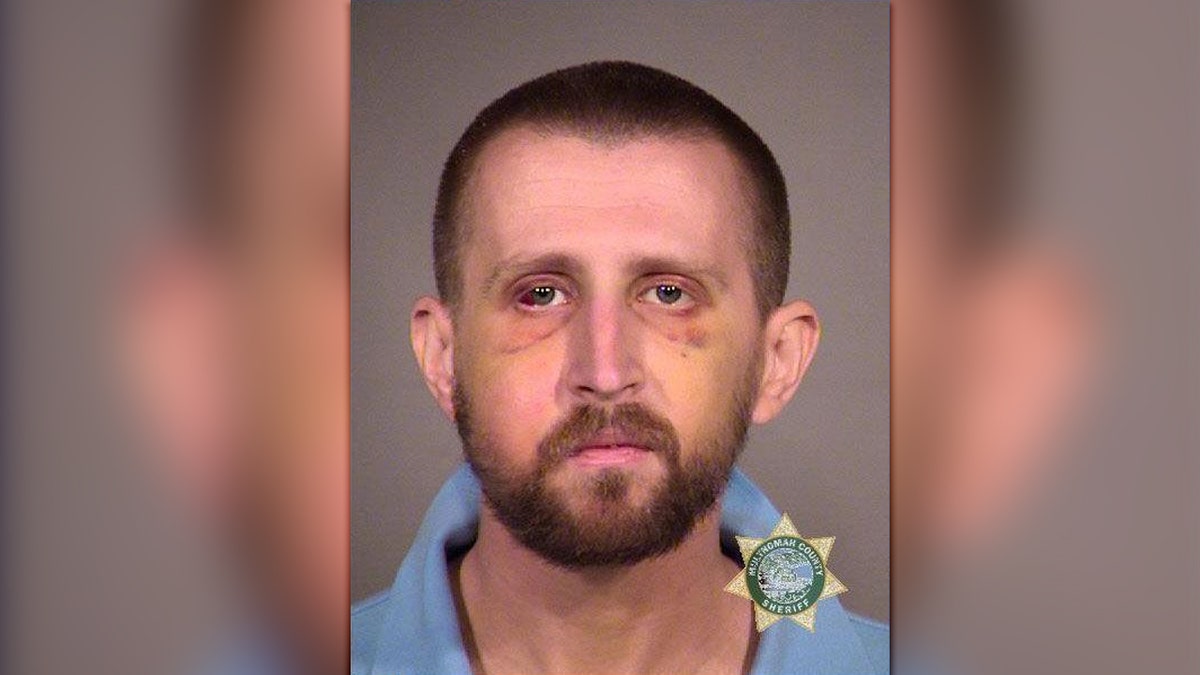 A booking photo shows Stolarzyk with two black eyes and other facial bruising. (Multnomah County Sheriff's Office)