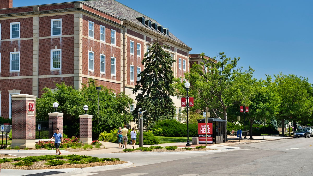 Lincoln, Nebraska, USA - July 9, 2013: Street side view of people at the campus of the University of Nebraska in downtown Lincoln.