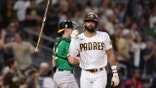 San Diego Padres' Fernando Tatis Jr. flips his bat after hitting a two-run home run against the Oakland Athletics during the third inning of a baseball game Tuesday, July 27, 2021, in San Diego. (AP Photo/Derrick Tuskan)