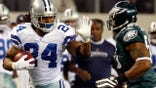 ARLINGTON, TX - JANUARY 03:  Running back Marion Barber #24 of the Dallas Cowboys runs the ball against the Philadelphia Eagles at Cowboys Stadium on January 3, 2010 in Arlington, Texas.  (Photo by Ronald Martinez/Getty Images)