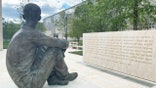 Statue of boy sitting on Eisenhower memorial