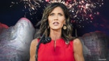 Kristi Noem, governor of South Dakota Governor, speaks during an event at Mount Rushmore National Memorial in Keystone, South Dakota, U.S., on Friday, July 3, 2020. The early Independence Day celebration, which will feature a speech by President Donald Trump, a military flyover and the first fireworks in more than a decade, is expected to include about 7,500 ticketed guests who won't be required to wear masks or socially distance despite a spike in U.S. coronavirus cases. Photographer: Al Drago/Bloomberg via Getty Images ________ Fireworks explode above the Mount Rushmore National Monument during an Independence Day event attended by the US president in Keystone, South Dakota, July 3, 2020. (Photo by SAUL LOEB / AFP) (Photo by SAUL LOEB/AFP via Getty Images)