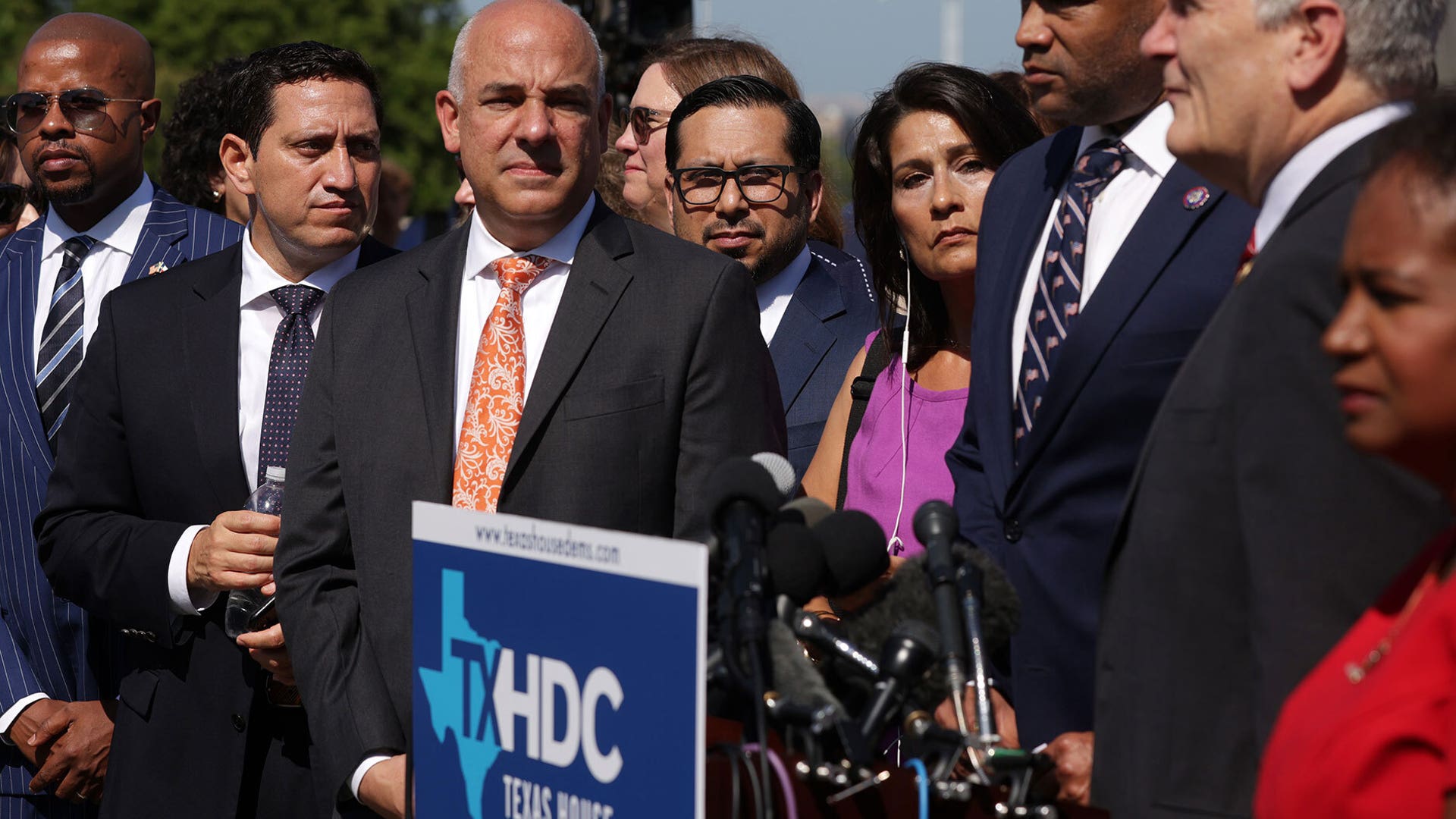 Texas State Rep. Chris Turner (D-District 101) (3rd L), chair of the Texas House Democratic Caucus, Texas State Rep. Trey Martinez Fischer (D-District 116) (2nd L), U.S. Rep. Marc Veasey (D-TX) (3rd R) and U.S. Rep. Lloyd Doggett (D-TX) (2nd R) during a news conference on voting rights outside the U.S. Capitol on July 13.