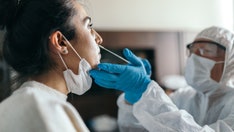 US COVID-19 cases rising again, doubling over three weeks