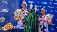 Joey Chestnut chows down 76 hot dogs, breaks own world record at annual Fourth of July contest