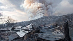 Couple charged in California fire sparked by gender reveal