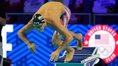 Unvaccinated US swimmer sparks debate as Olympics start