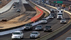 Car jumps California highway in shocking crash caught on camera