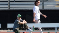 Gwen Stefani, Gavin Rossdale spotted keeping their distance during first reunion since she wed Blake Shelton