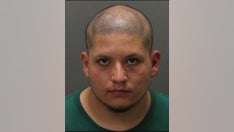 Friends of California movie theater shooting suspect believed he had gun, snuck out of cinema, detective says