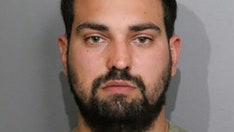 Iowa man charged after allegedly bringing loaded rifle with laser scope to Chicago hotel overlooking beach