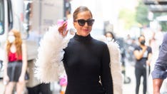 Lady Gaga continues to impress in angel wings, platform heels and a little black dress