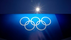 Canada's Summer McIntosh, 14, puts Olympics on notice with record swim