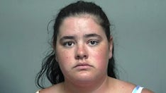 Michigan woman accused of shooting neighbor’s cat with crossbow