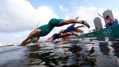 Olympic triathletes react to bizarre boat incident in event's first leg