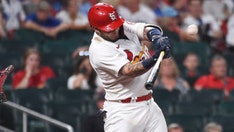 Molina lifts Cards to 3-2 win over Cubs in 10 innings