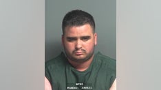 Houston man arrested after allegedly shooting a police officer, spitting in woman's face over parking dispute