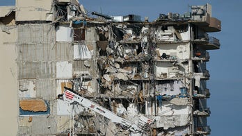 Florida condo collapse: Couple married nearly 60 years found lying together when bodies recovered