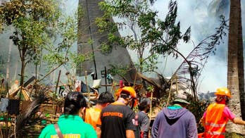 Philippine military plane crashes, 31 dead, 50 rescued
