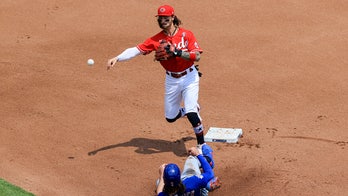 Bullpen strong again as Reds hand Cubs 9th straight loss