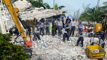 Miami condo collapse death toll rises to 27 after demolition clears way for search to resume